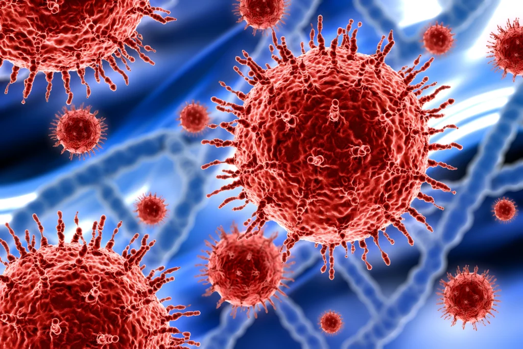 Image grossit d'un virus de couleur rouge avec un fond bleu